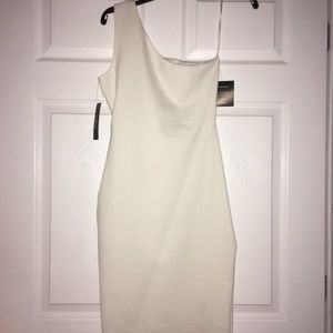 Lulu’s white, one shoulder body con dress.